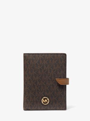 michael kors mens logo passport wallet|Michael Kors passport collection.